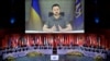 Украинскиот претседател Володимир Зеленски (на екранот) зборува на отворањето на четвртиот Самит на шефови на држави и влади на Советот на Европа, во концертната сала Харпа во Рејкјавик, Исланд на 16 мај 2023 година.