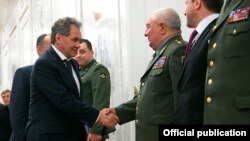 Russia - Defense Minister Sergey Shoygu (L) greets visiting top military officials from Armenia, Moscow, 17Apri2013.