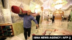 Шираз шаарындагы шии агымын карманган жарандардын Шах Чераг күмбөзү кол салуудан кийин. 