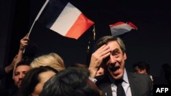 France -- French presidential election candidate for the right-wing Les Republicains (LR) party Francois Fillon (C) stands amongst supporters after delivering a speech during a campaign rally in Pertuis, March 15, 2017