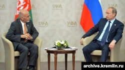 FILE: Russian President Vladimir Putin met President Ashraf Ghani of Afghanistan in July 2015.