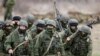 Окупація українського Криму. Російські військові без розпізнавальних знаків (так звані «зелені чоловічки») у селі Перевальне, 5 березня 2014 року