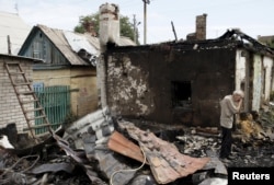 Зруйнований внаслідок обстрілу будинок у Донецьку. 17 серпня 2015 року