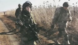 Олена Білозерська, доброволець ДУК ПС та іі побратими на завданні. Донбас, 6 листопада 2014 року
