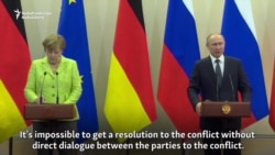 Putin și Merkel, discuții în controversă la Soci pe tema Ucrainei