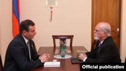 Armenia - Artak Zakarian (L), the chairman of the Armenian parliament’s committee on foreign affairs, meets with Israel’s ambassador to Armenia, Shmuel Meirom, in Yerevan, 21Aug2013.