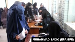 Afghan women cast their vote during the parliamentary elections in Kandahar in October 2018.