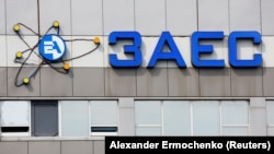 UKRAINE – A view shows a logo on the facade of the Russian-controlled Zaporizhzhia Nuclear Power Plant before the arrival of the International Atomic Energy Agency (IAEA) expert mission. Outside Enerhodar in the Zaporizhzhia region, September 1, 2022