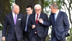 French Foreign Minister Laurent Fabius (left), Ukrainian Foreign Minister Pavlo Klimkin, German Foreign Minister Frank-Walter Steinmeier, and Russian Foreign Minister Sergei Lavrov attend a meeting on Ukraine in Berlin in August 2014. 