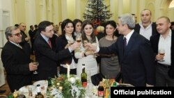 Armenia - President Serzh Sarkisian congratulates journalists at a New Year's reception, 29Dec2011.